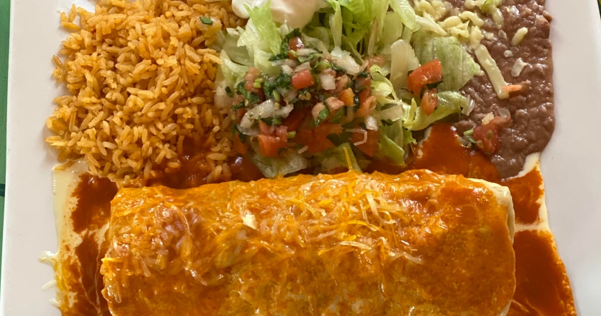 A burrito with rice, beans, and salsa at El Charro